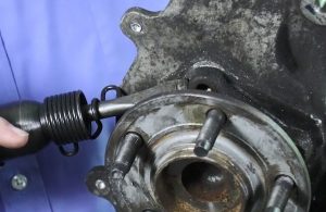 use of air hammer to remove stuck wheel assembly